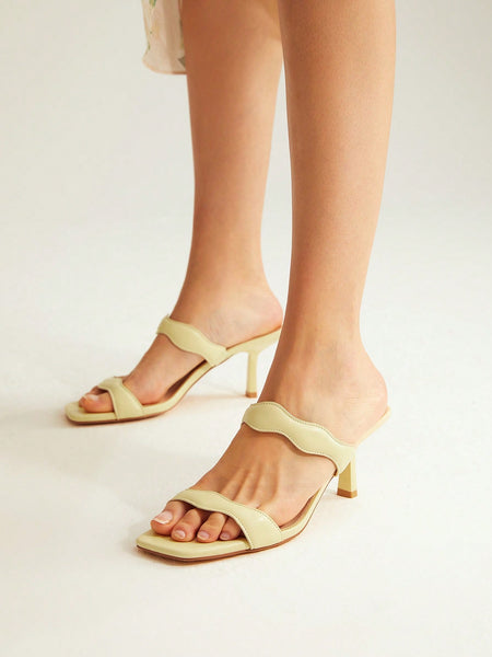 SCALLOP MULE HEELED SANDALS