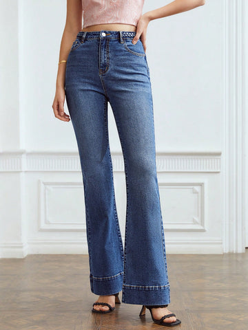FLARED JEANS WITH BRAIDED WAIST