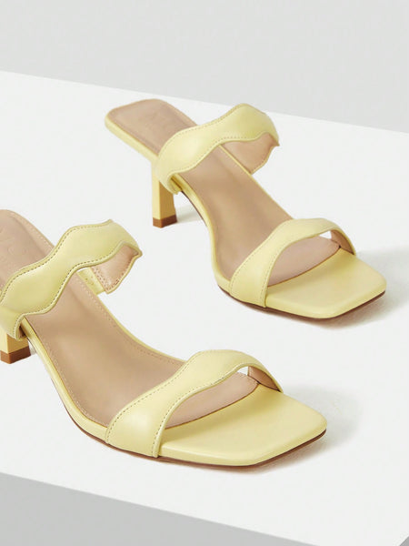 SCALLOP MULE HEELED SANDALS