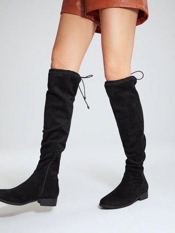 SLOUCHY KNEE-HIGH BOOTS